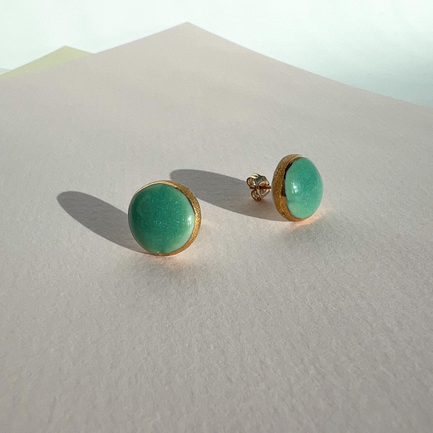 Gold-Rimmed Turquoise Ceramic Stud Earrings